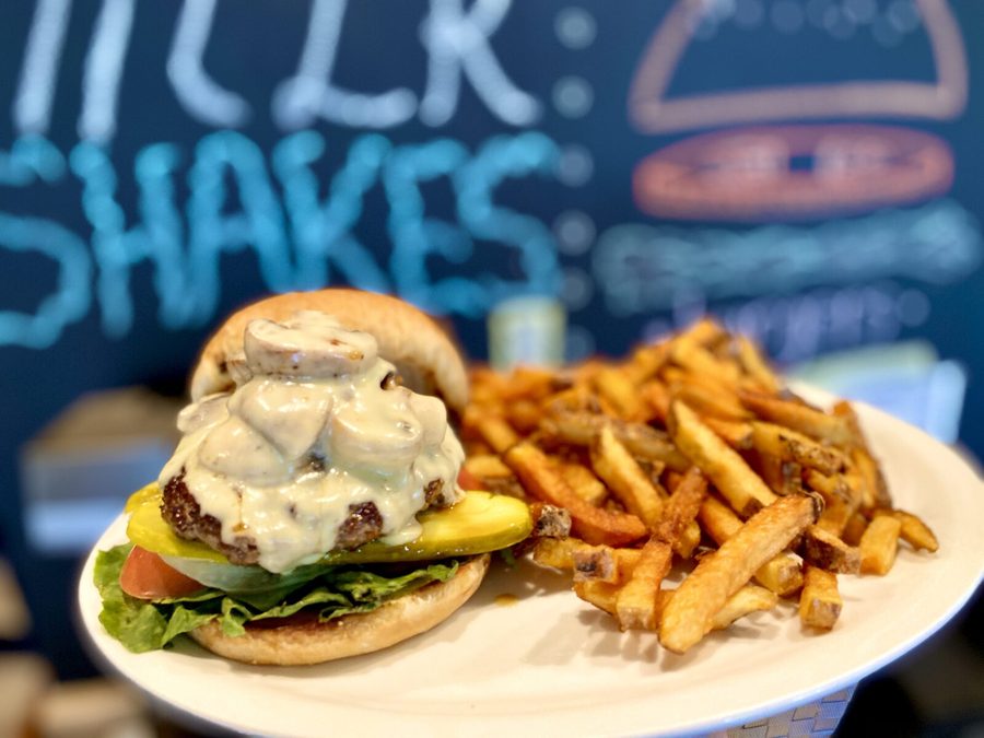 Mushroom Swiss burger with grilled mushrooms, Swiss cheese and fresh cut fries