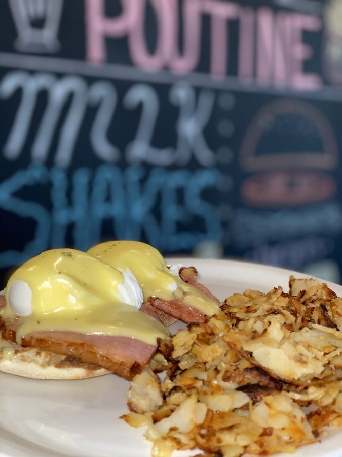 Eggs Benedict with back bacon, poached eggs, hollandaise and homefries